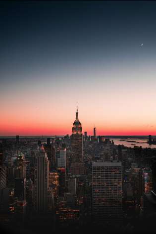 Skyline view of new york with a sunset.