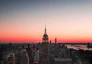 Skyline view of new york with a sunset.
