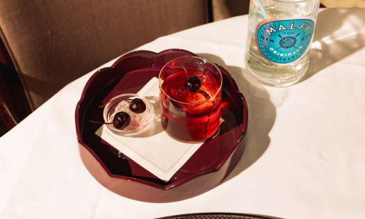 Photo of negroni topped with cherry at Nipotina.