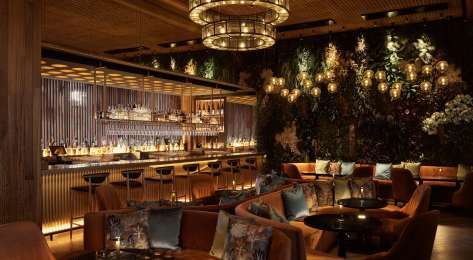 Nobu marrakech bar area with sofas .