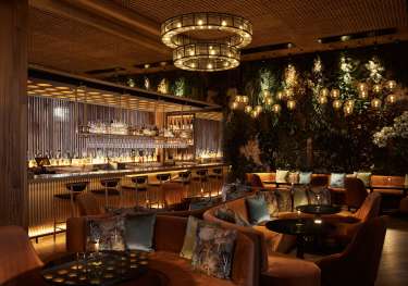 Nobu marrakech bar area with sofas .