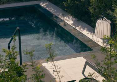 Swimming pool at hotel room.