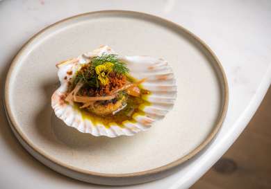 Scallop dish at orion restaurant .