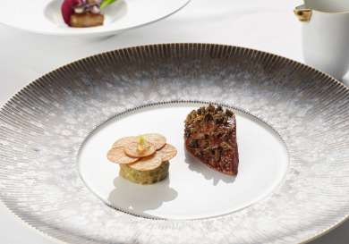 Dish at restaurant with vegetables .