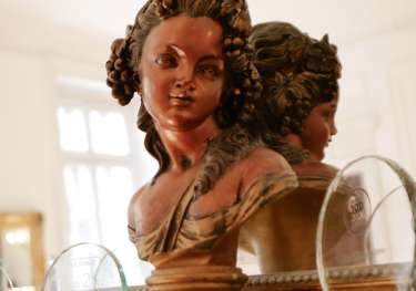 Sculpture on mantlepiece.