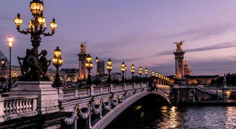 Paris bridge in the evening.