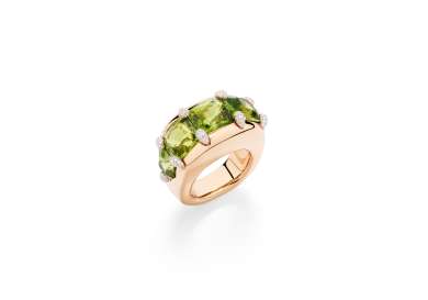 Gold ring with peridot gems.