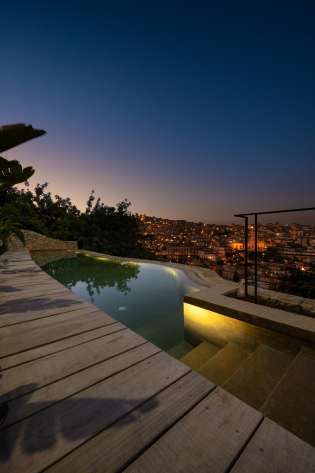 Hotel swimming pool in evening.