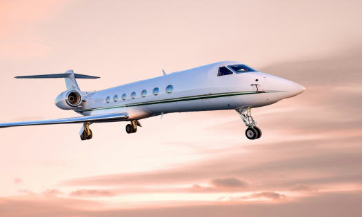 Private jet on pink cloud background.