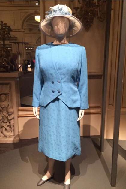 Queen's outfit blue.