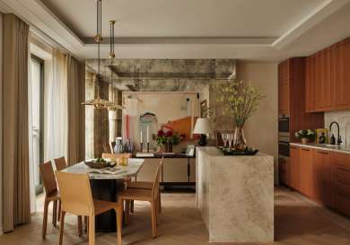 Kitchen with natural woods and marble .