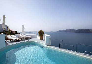 Santorini traditionalism   ikies hotel review pool.