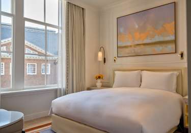 Photo of bedroom inside amsterdam hotel.