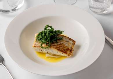 Fish dish topped with samphire.