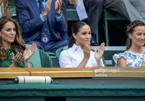 Kate Middleton, Meghan Markle, and Pippa Middleton clapping at Centre Court, Wimbledon.