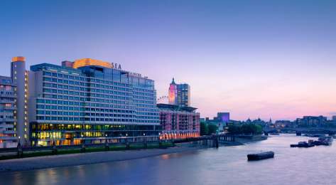 Exterior view of sea containers at sunset .