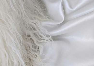 Fluffy pillow and silky sheet.