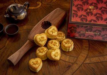 Spring moon limited edition mini heart shaped egg custard mooncakes.