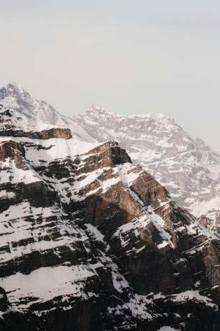 View of swiss mountains covered in snow .