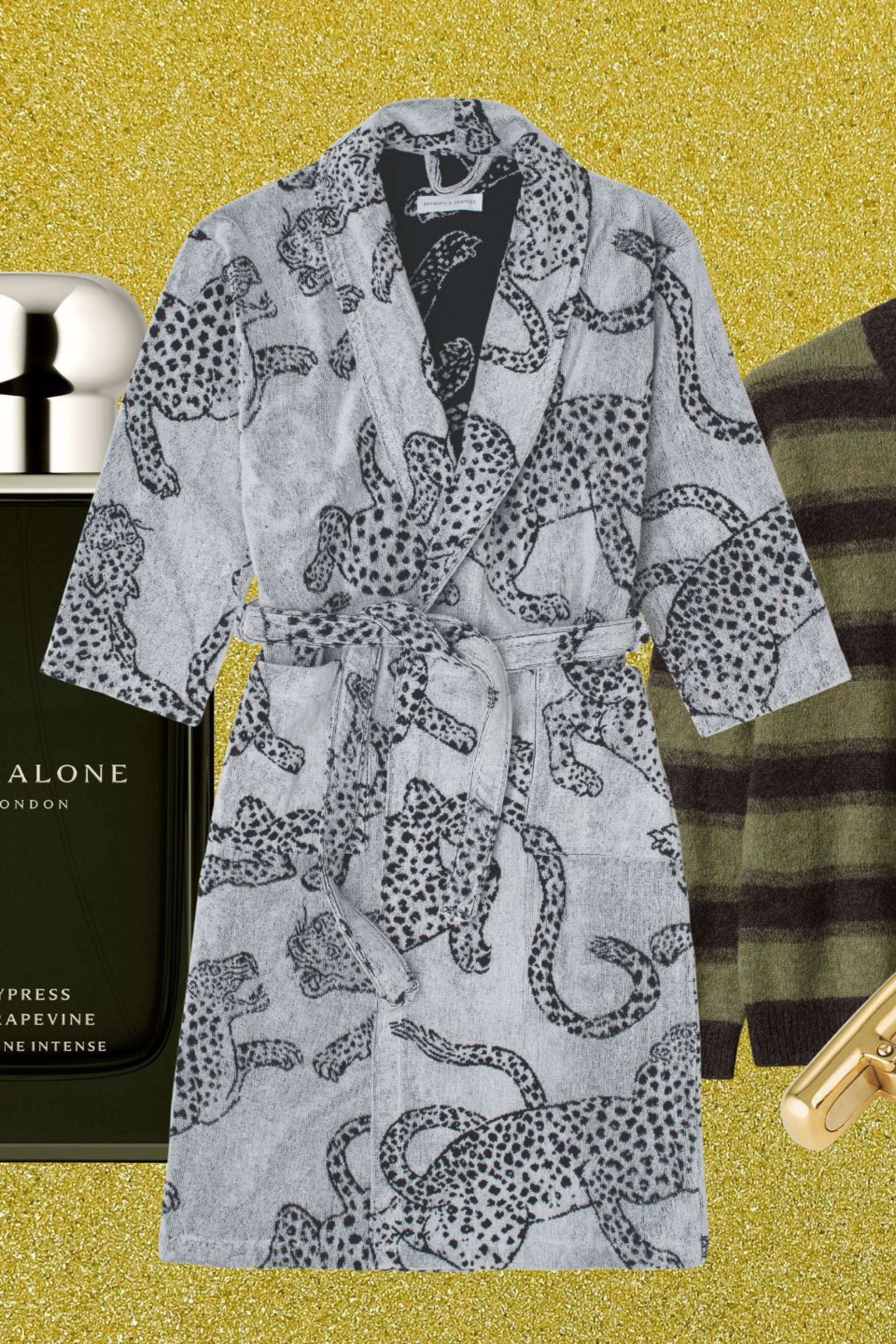 array of men's gifts on gold glitter background