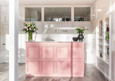 Pink front desk in london beauty clinic .