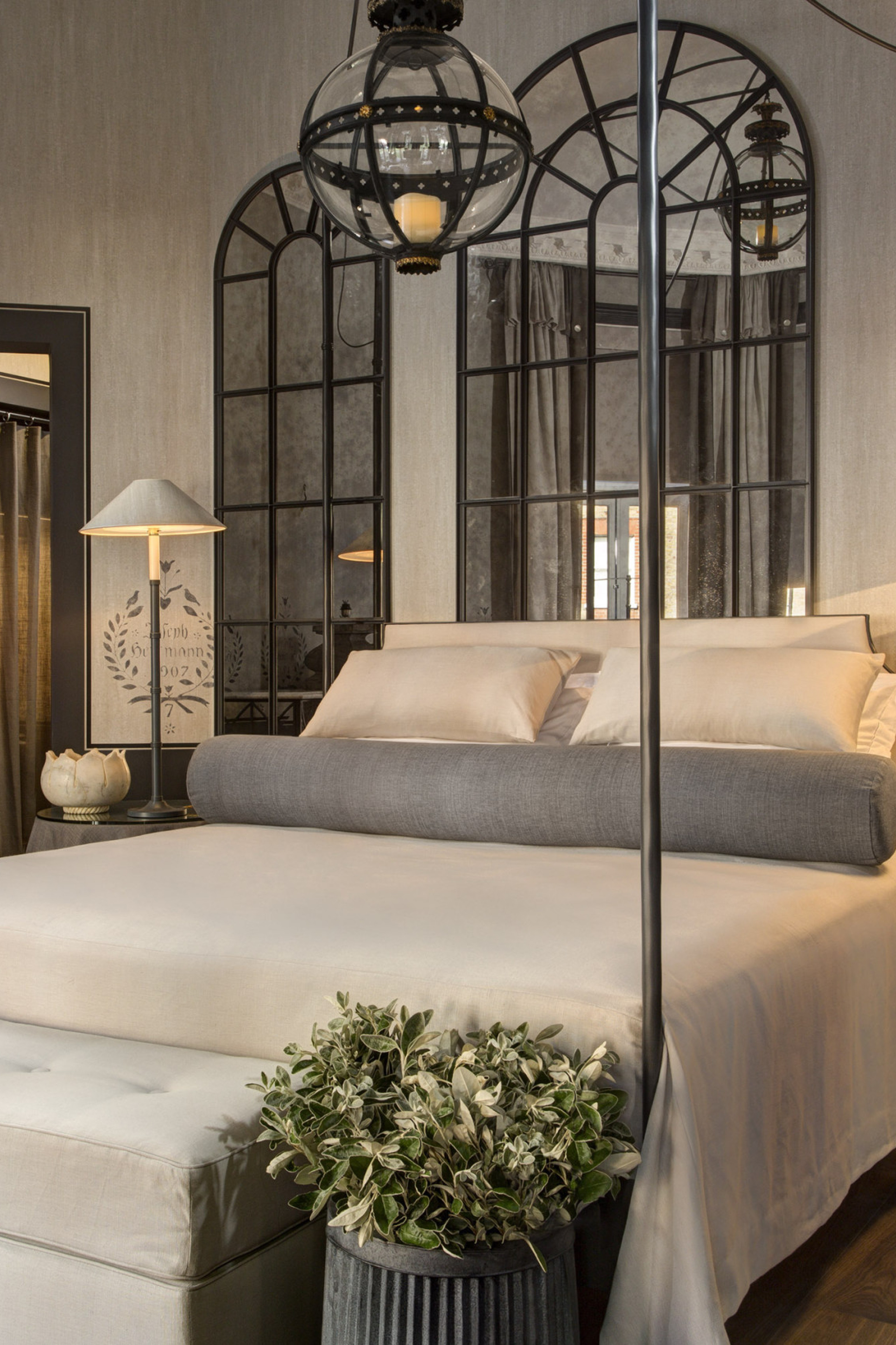 franklin hotel garden suite with mirrors behind the bed