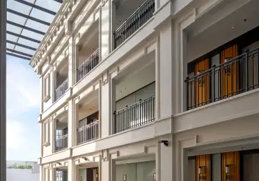 Outdoor swimming pool at the george penang hotel .