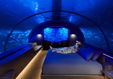 The muraka_undersea bedroom_couple_night_hero_credit justin nicholas hi res copy.