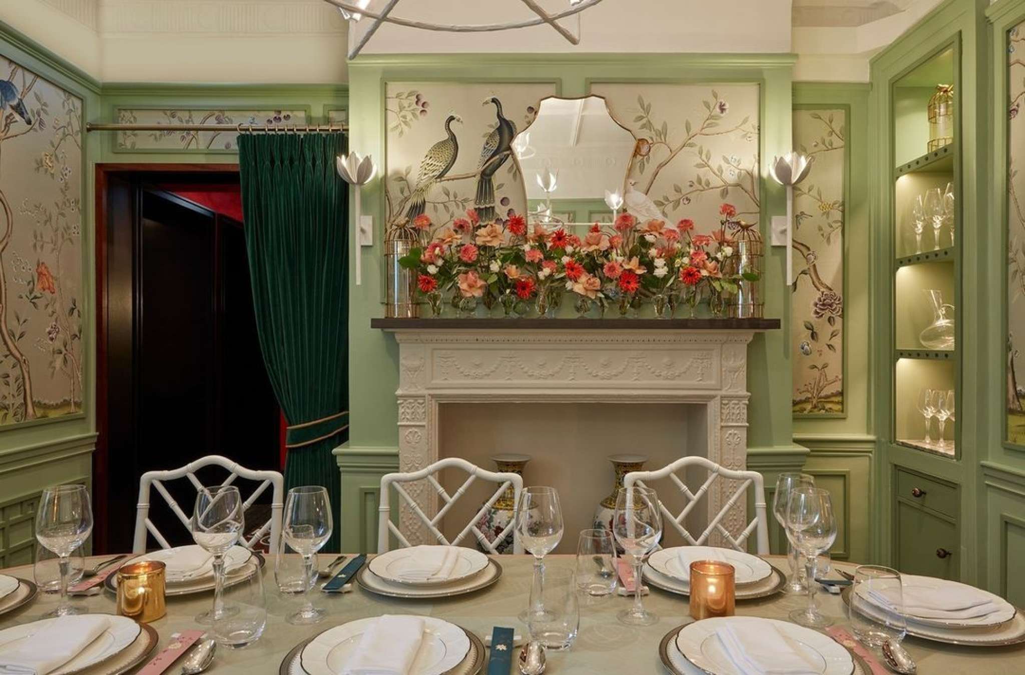 The peacock room   laden with intricate details and apt for intimate celebrations  __our beautiful private dining room of hand painted silk chinoiserie wallpaper features the rooms signature peacock watching over a table for 8 in front o.