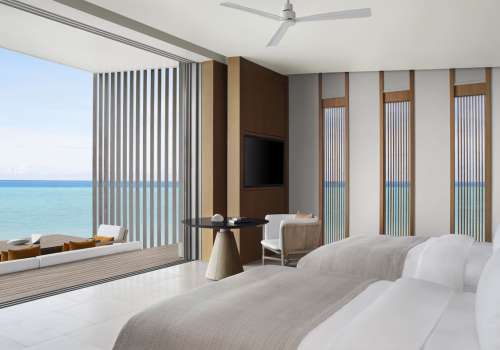 The ritz carlton maldives, fari islands   two bedroom overwater villa   twin bedroom.