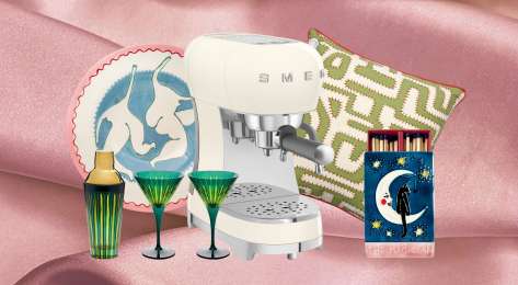 Array of gifts for the home on blush pink fabric background.