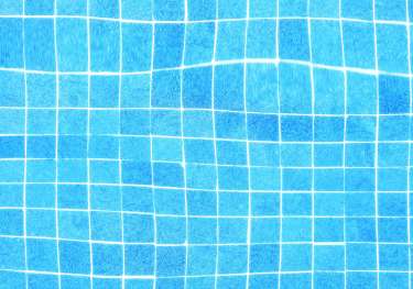 Aerial view of blue swimming pool tiles.
