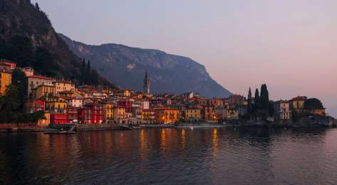 Lake como town at sunset .