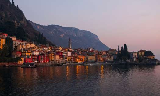 Lake como town at sunset .