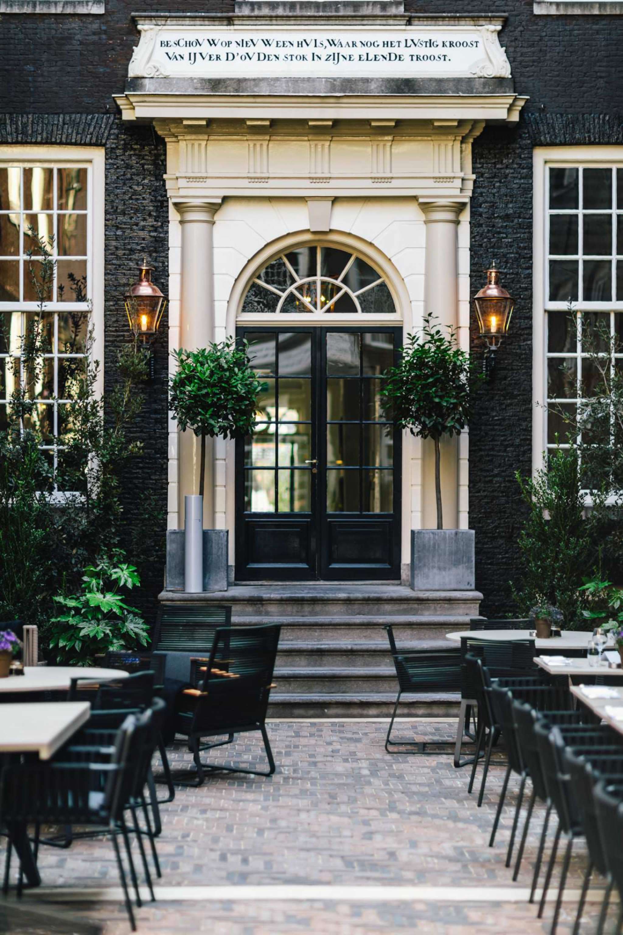 The Dylan Amsterdam: A hidden boutique hotel outside dining.