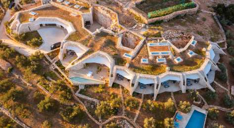 Aerial view of hotel in croatia with swimming pool .