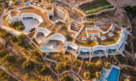 Aerial view of hotel in croatia with swimming pool .