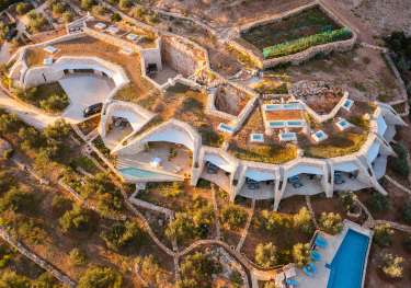 Aerial view of hotel in croatia with swimming pool .