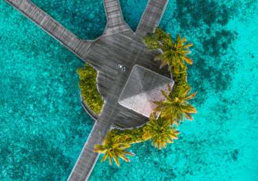 Aerial view of jetty at W Maldives .