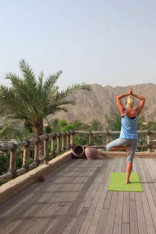 Yoga with a view at the six senses zighy bay in oman.