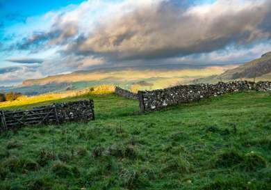 The yorkshire dales with hills in the background.