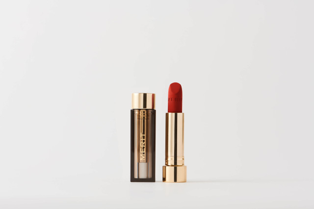 red lipstick in gold container