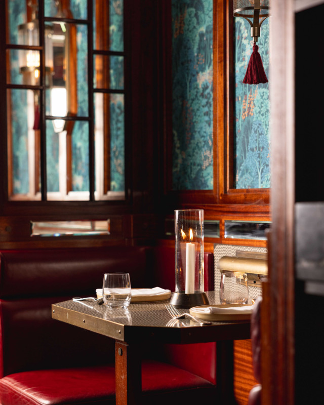 table at miko mei fair with hurricane glass lamp 