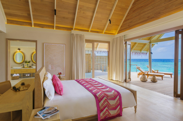 bedroom inside water pool villa at Milaidhoo Maldives 