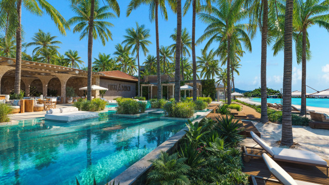 nikki beach beachclub with outdoor pool and sun loungers