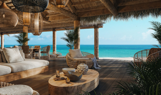decking area with round chairs and large sofas 