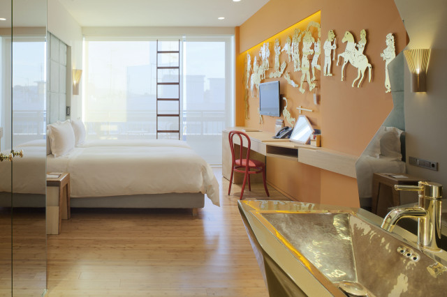 hotel bedroom with artwork