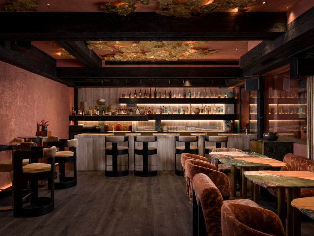 bar with stools and square tables