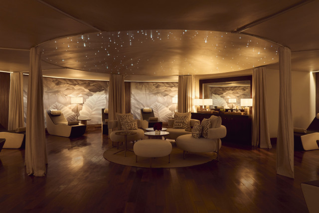 spa relaxation area with cream sofas 