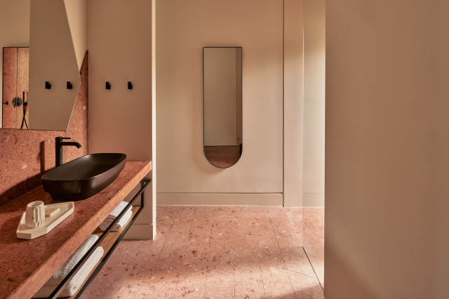 hotel bathroom with terracotta tiles